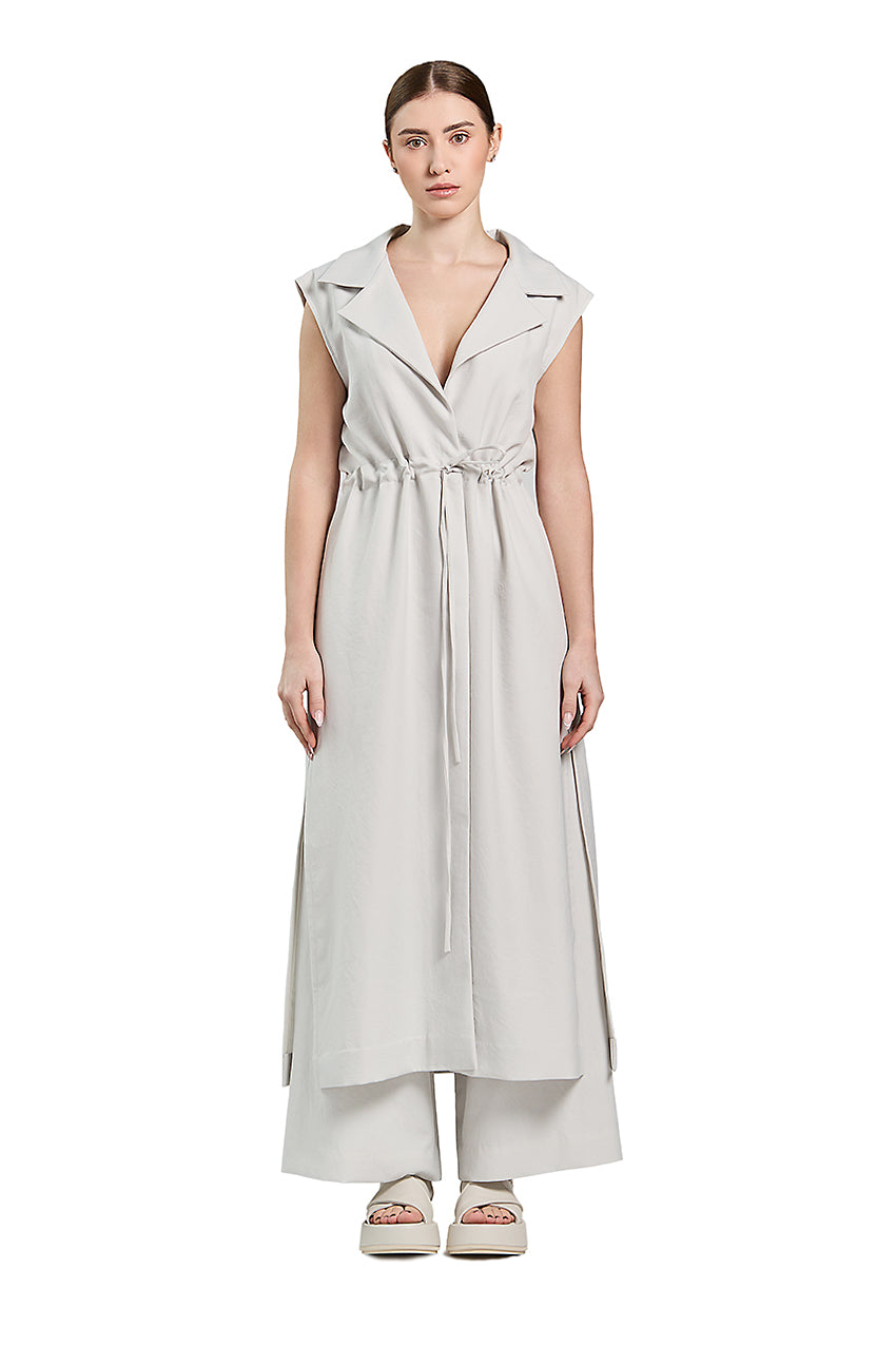  Juna Vest with Drawstring Waist for a casual-chic look that never goes out of style, this vest goes the extra mile. The drawstring waist creates a flattering silhouette and functionality.