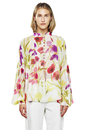 A stand collar and balloon sleeves delight this airy floral-print blouse that's charming and polished.