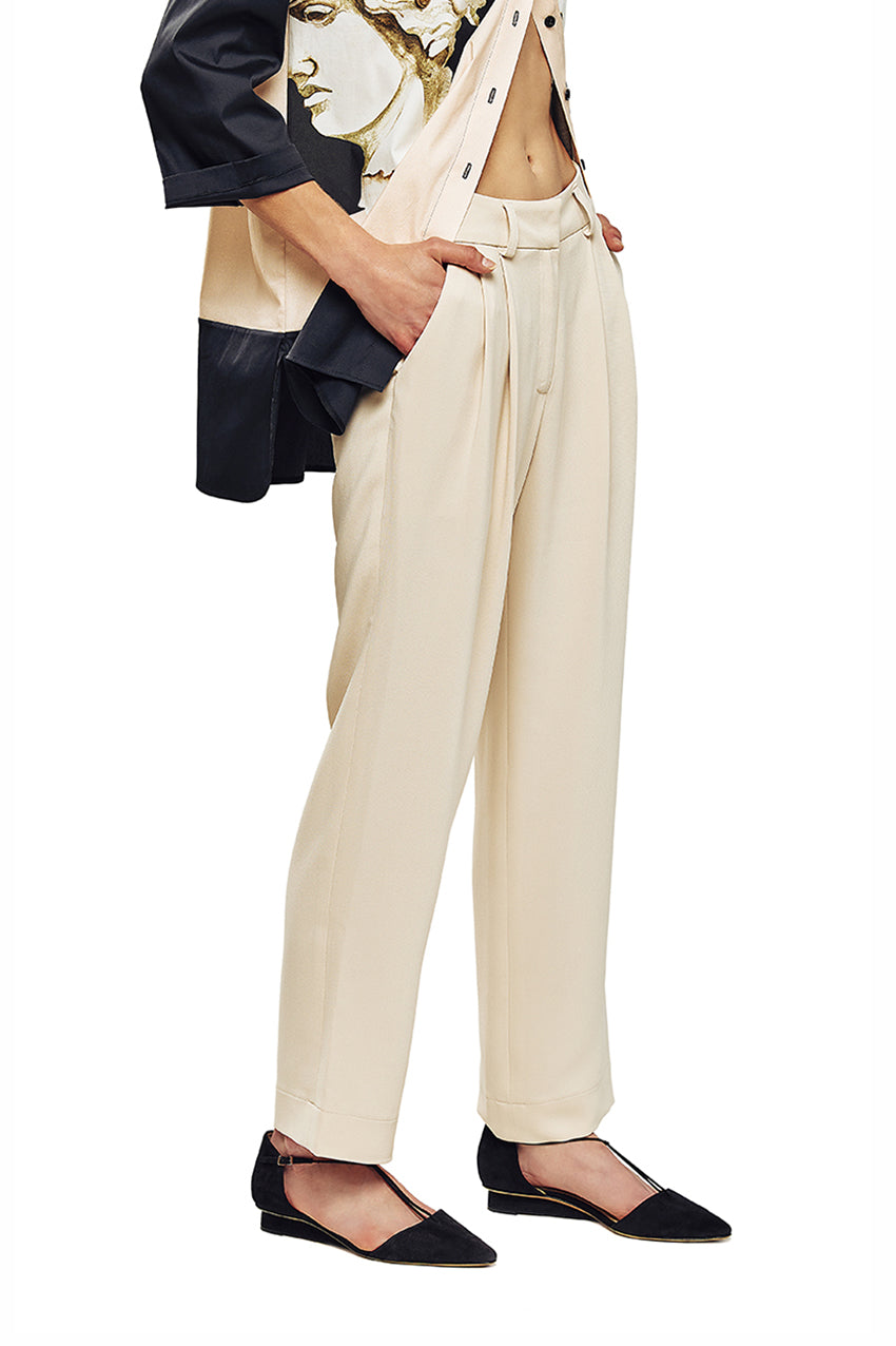 Elevate your wardrobe for casual or special occasions with these Pleated Taper Trouser from JUNA. Tailored in a regular fit with a taper silhouette, these pleated-front pants sport a high-rise waist with belt loops, a fly hook and a zipper closure for a flattering, sleek look.