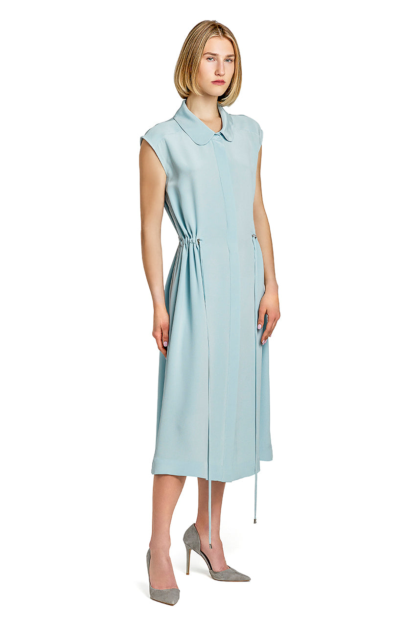 Cut from light viscose blend JUNA dress has a floaty silhouette that you can cinch to your liking thanks the drawstring waist. Complete your look with gold hoop and a straw bag.